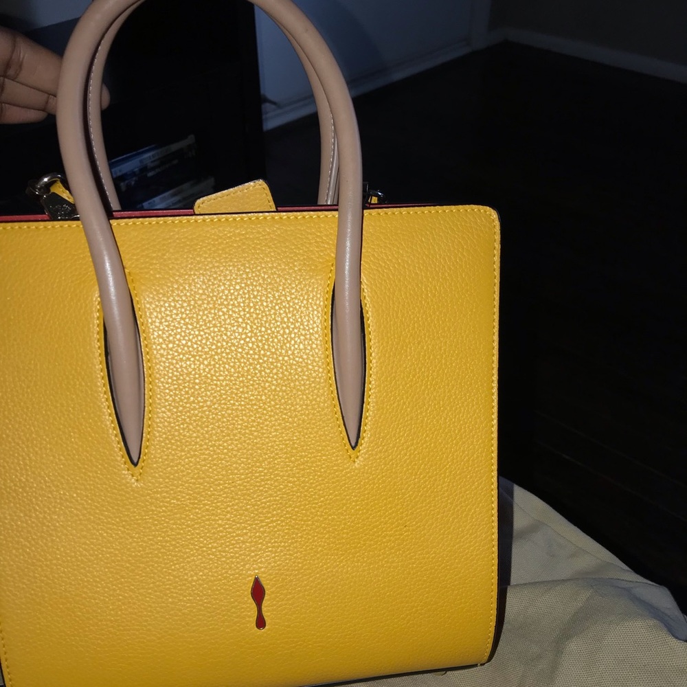 Yellow christian louboutin purse